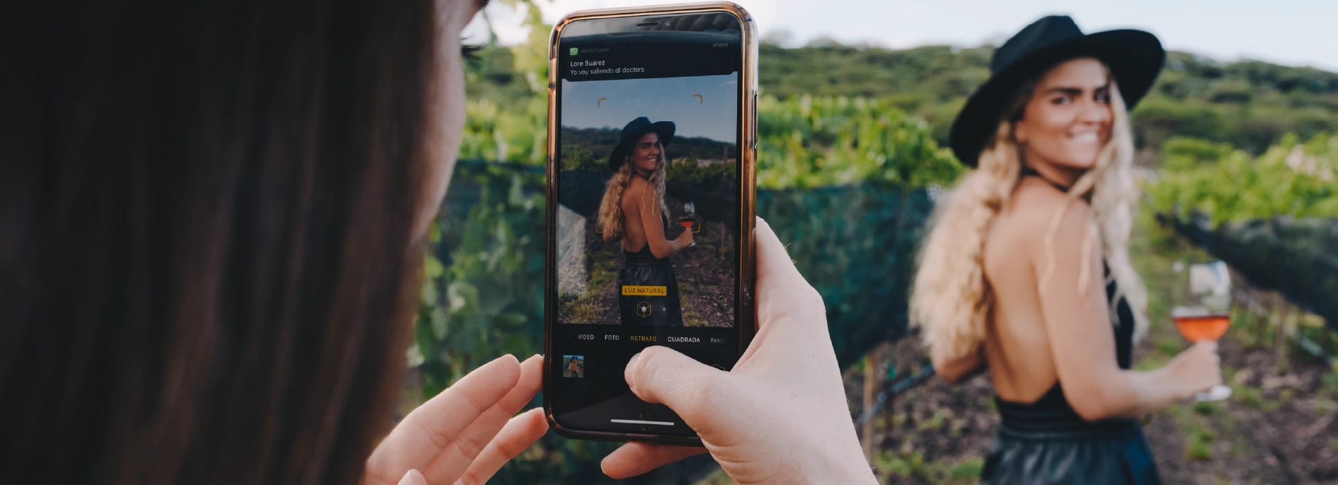 Guests gathered socially around the wine experience at Puerta del Lobo
