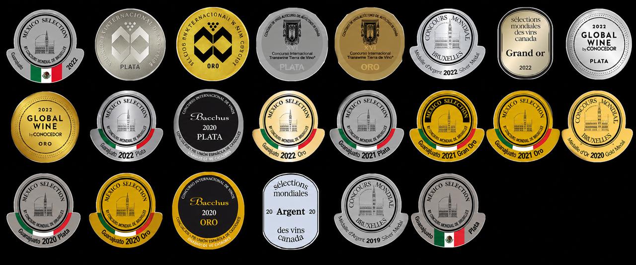Puerta del Lobo award medallero - international and Mexican wine recognitions across Bacchus, Concours Mondial Bruxelles, Sélections Mondiales Canada, Global Wine, and Mexico Selection